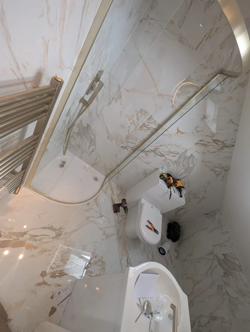 Rosaline Road en-suite with brass towel radiator, WC and basin