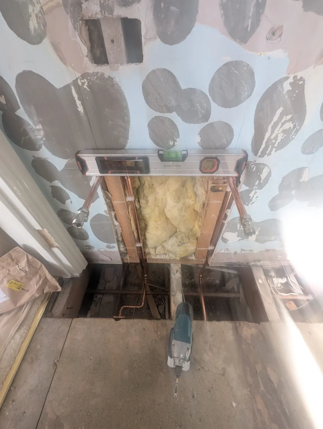 New copper pipework being set out in the Rosaline Road en-suite